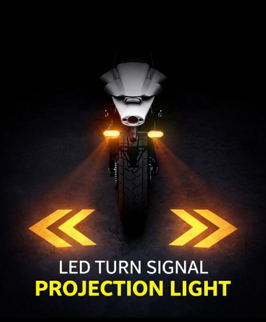 2:42 PM Nazmul Motorcycle LED Turn Signal Projection Light projecting bright yellow arrow signal on road at night for better visibility and safety